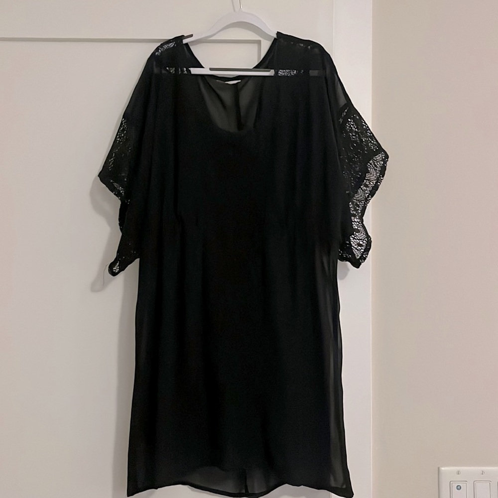 Black chiffon lace dress with wide sleeves.